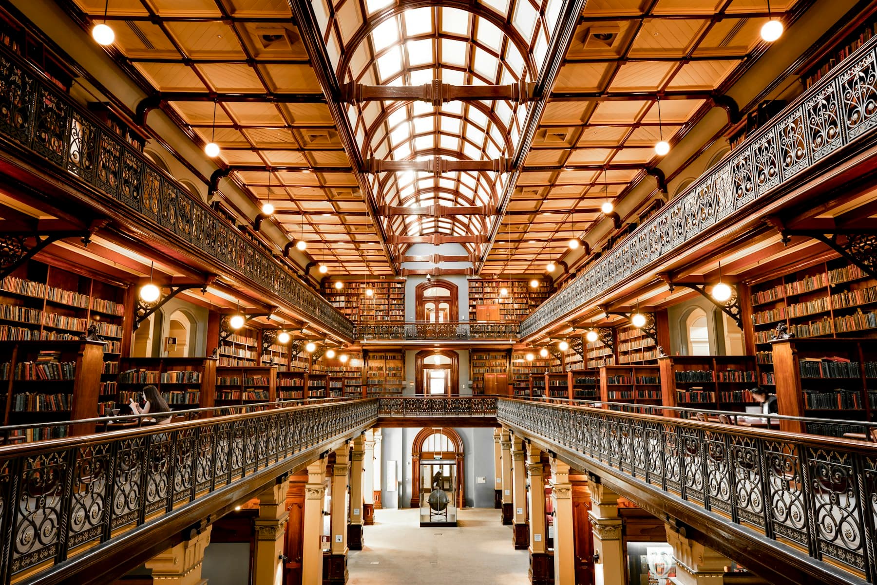 A grand old library with a glass roof
